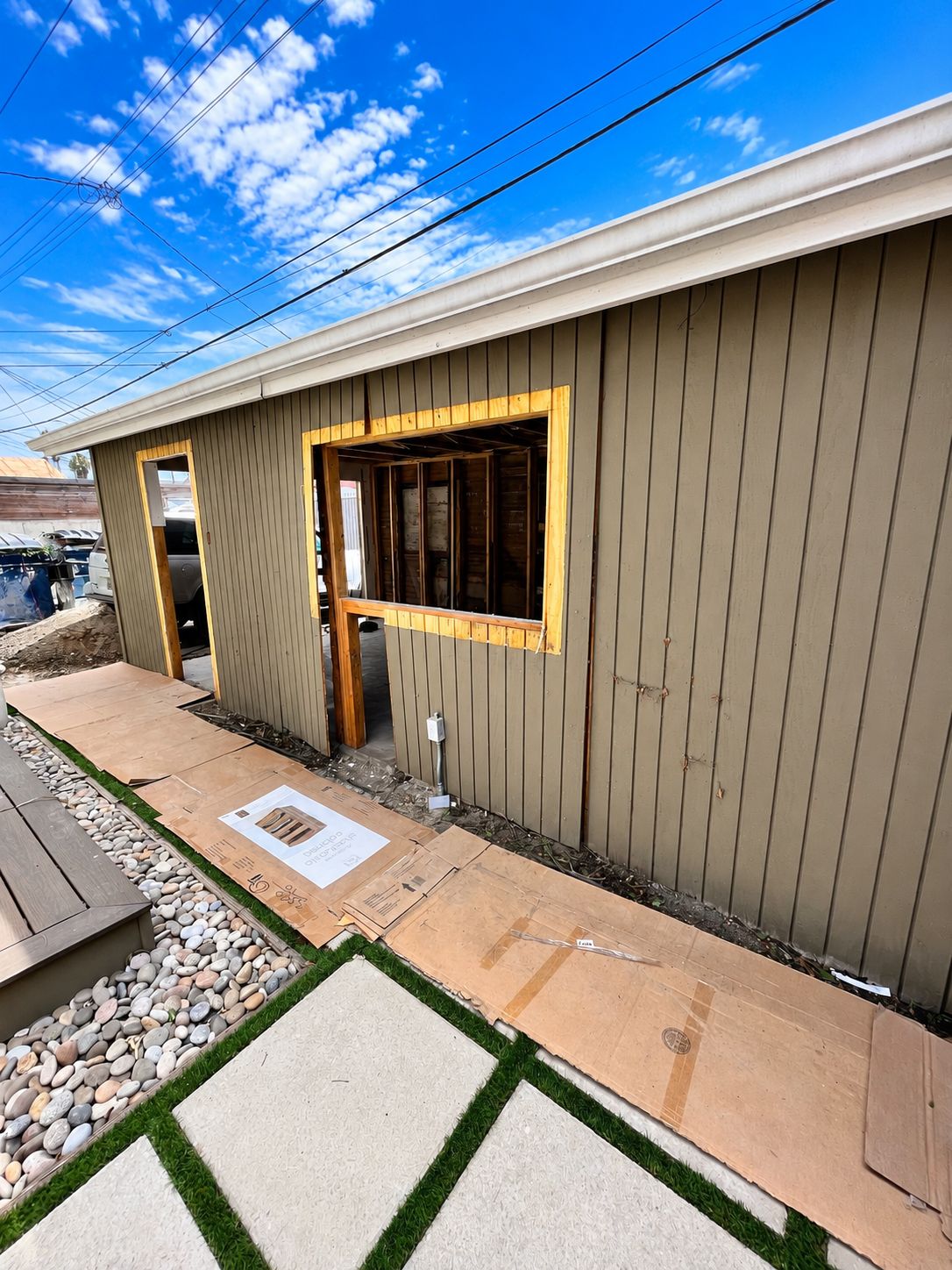 Exterior siding and window openings during construction